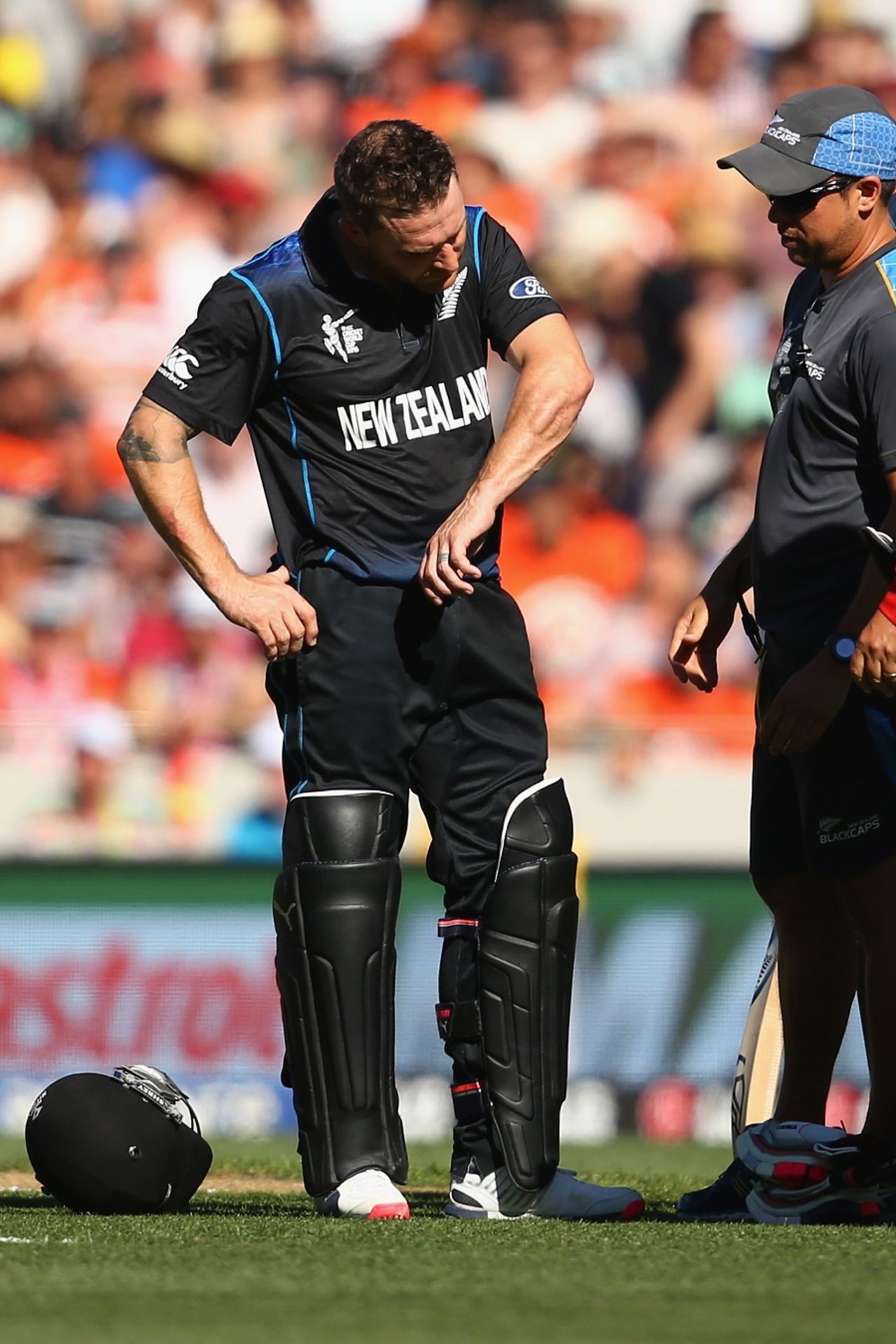 Brendon McCullum examines his arm after taking a hit, New Zealand v Australia, World Cup 2015, Group A, Auckland, February 28, 2015