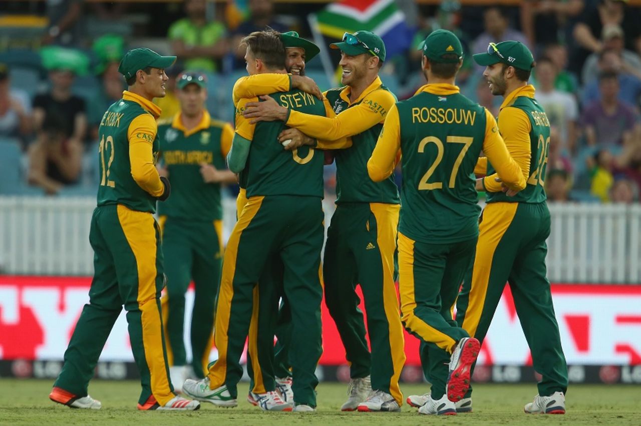Hashim Amla embraces Dale Steyn after taking the catch to dismiss Ed Joyce, Ireland v South Africa, World Cup 2015, Group B, Canberra, March 3, 2015