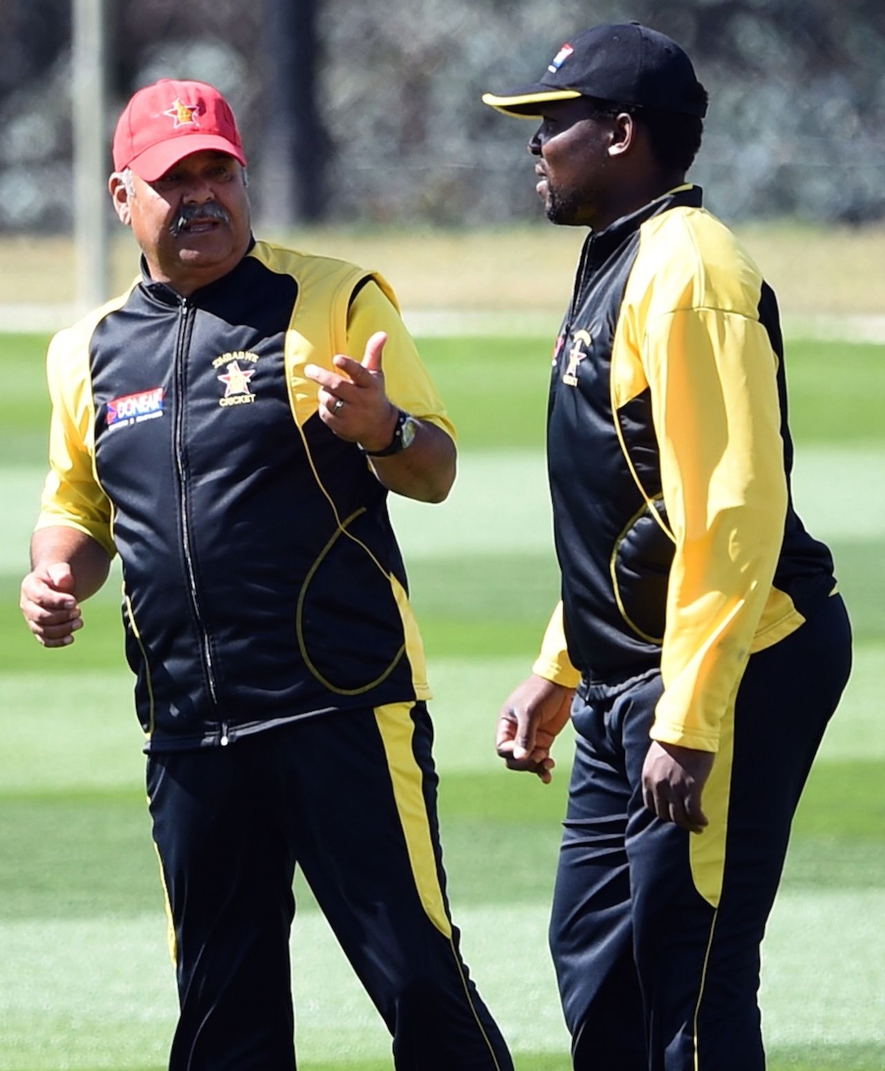 Dav Whatmore has a chat with Hamilton Masakadza, World Cup 2015, Canberra, March 4, 2015