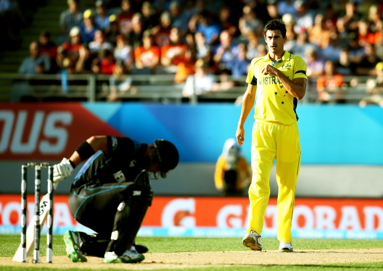 Mitchell Starc looks at Corey Anderson on the ground, New Zealand v Australia, World Cup 2015, Group A, Auckland, February 28, 2015