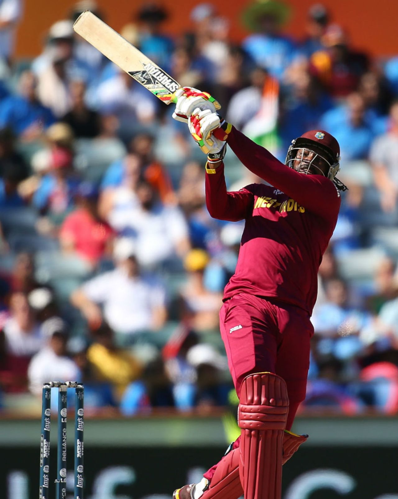 Chris Gayle gives it his all while playing a pull shot, India v West Indies, World Cup 2015, Group B, Perth, March 6