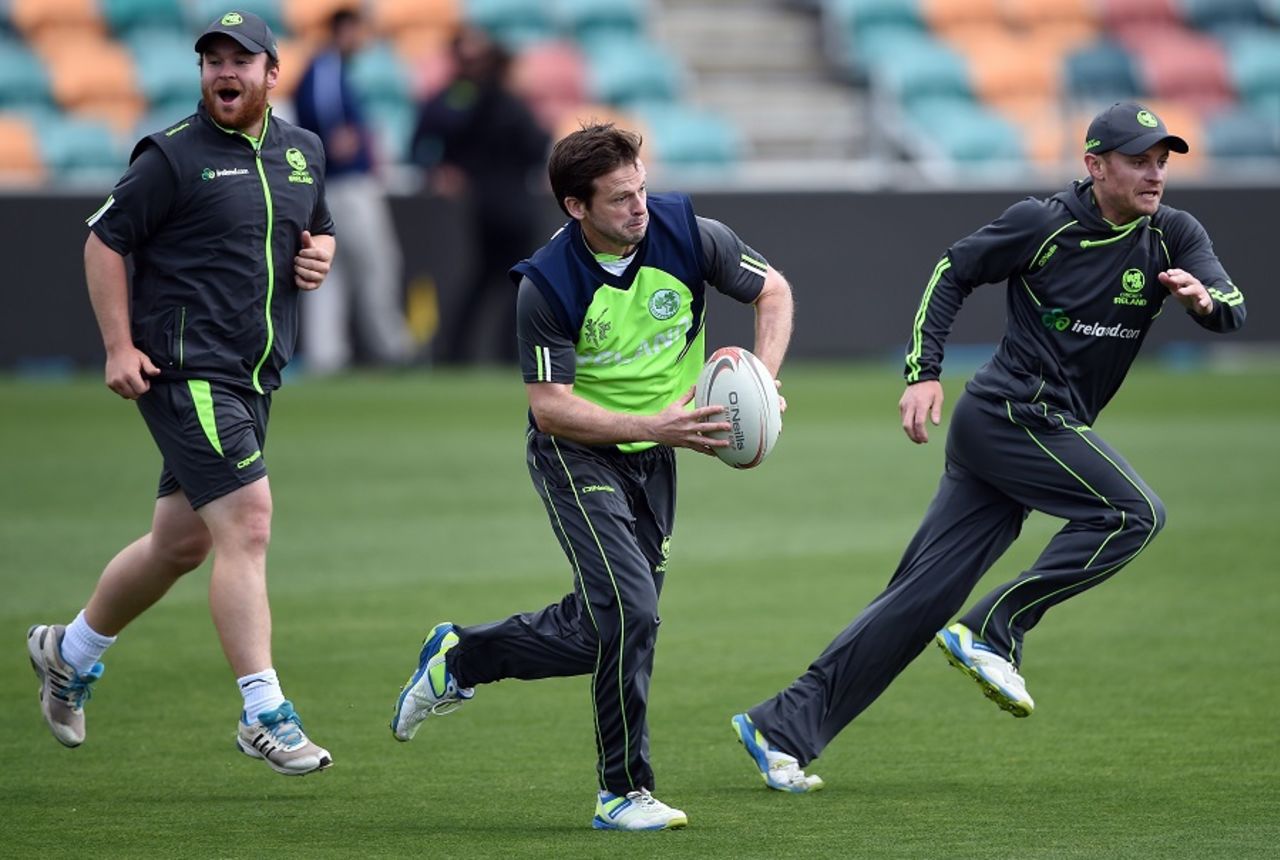 Can't stop me: Ed Joyce, William Porterfield and Paul Stirling play some rugby, Ireland v Zimbabwe, World Cup 2015, Group A, Hobart, March 6, 2015