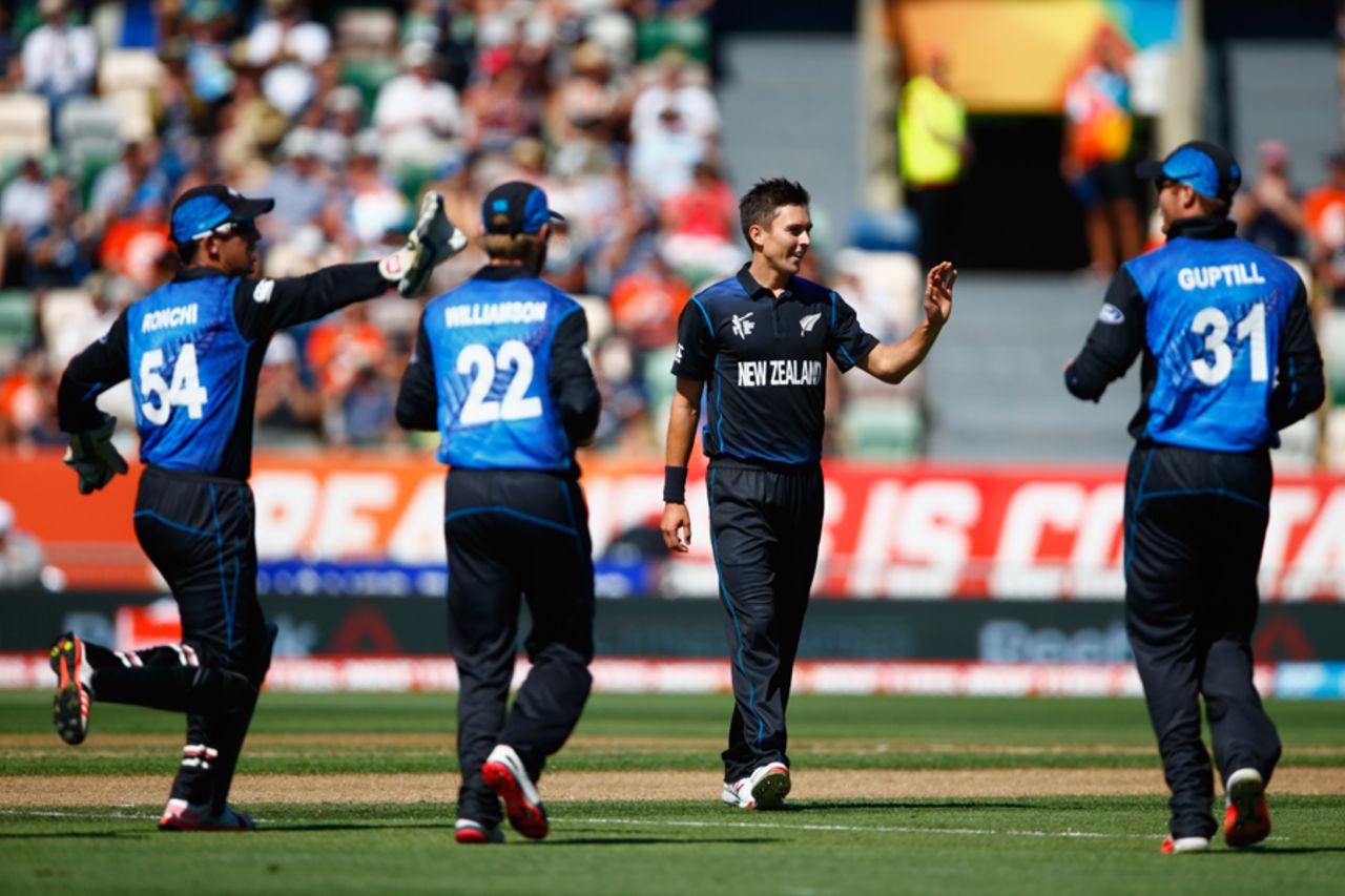 New Zealand gather around Trent Boult after an early wicket, New Zealand v Afghanistan, World Cup 2015, Group A, Napier, March 8, 2015