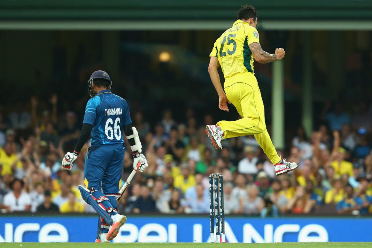 Mitchell Johnson leaps in the air to celebrate the wicket of Lahiru Thirimanne, Australia v Sri Lanka, World Cup 2015, Group A, Sydney, March 8, 2015