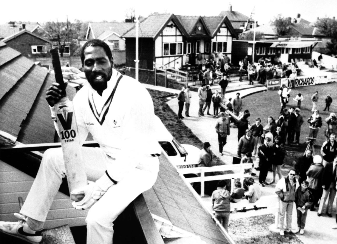 Viv Richards sits on top of a stand at the Rishton club ground, May 3, 1987