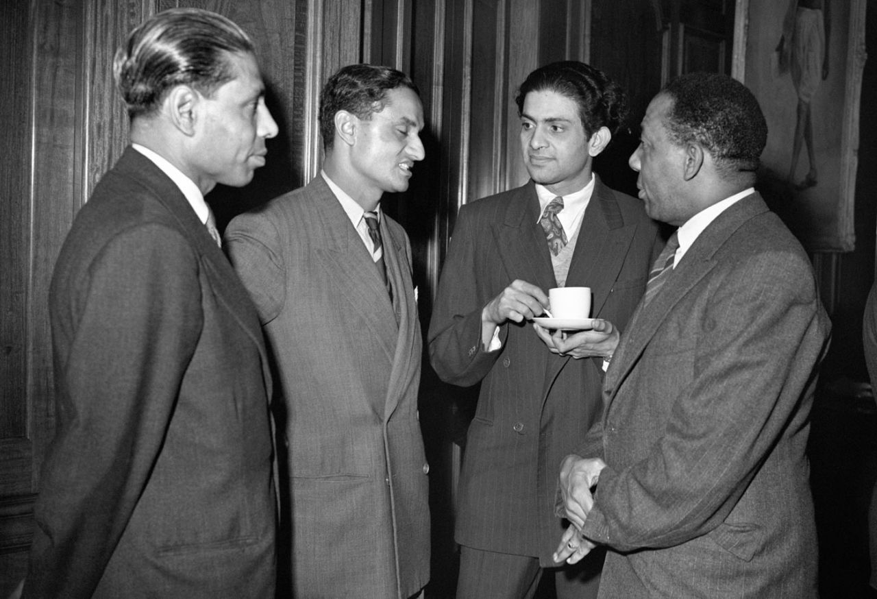 Berry Sarbadhikary, Vijay Hazare and PK Mukerji talk to Learie Constantine at a tea party at India House, September 15, 1952