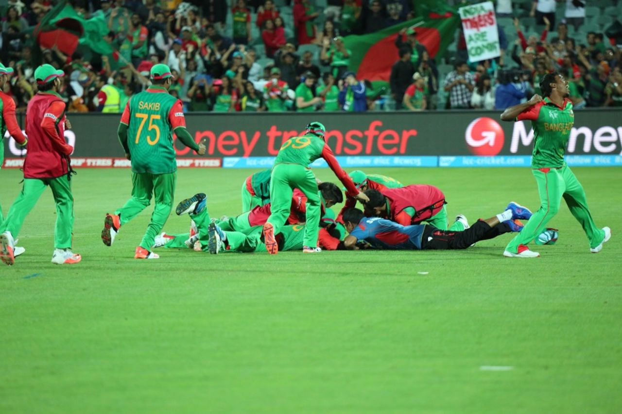 The Bangladesh players pile on top of each other after their victory, England v Bangladesh, World Cup 2015, Group A, Adelaide, March 9, 2015