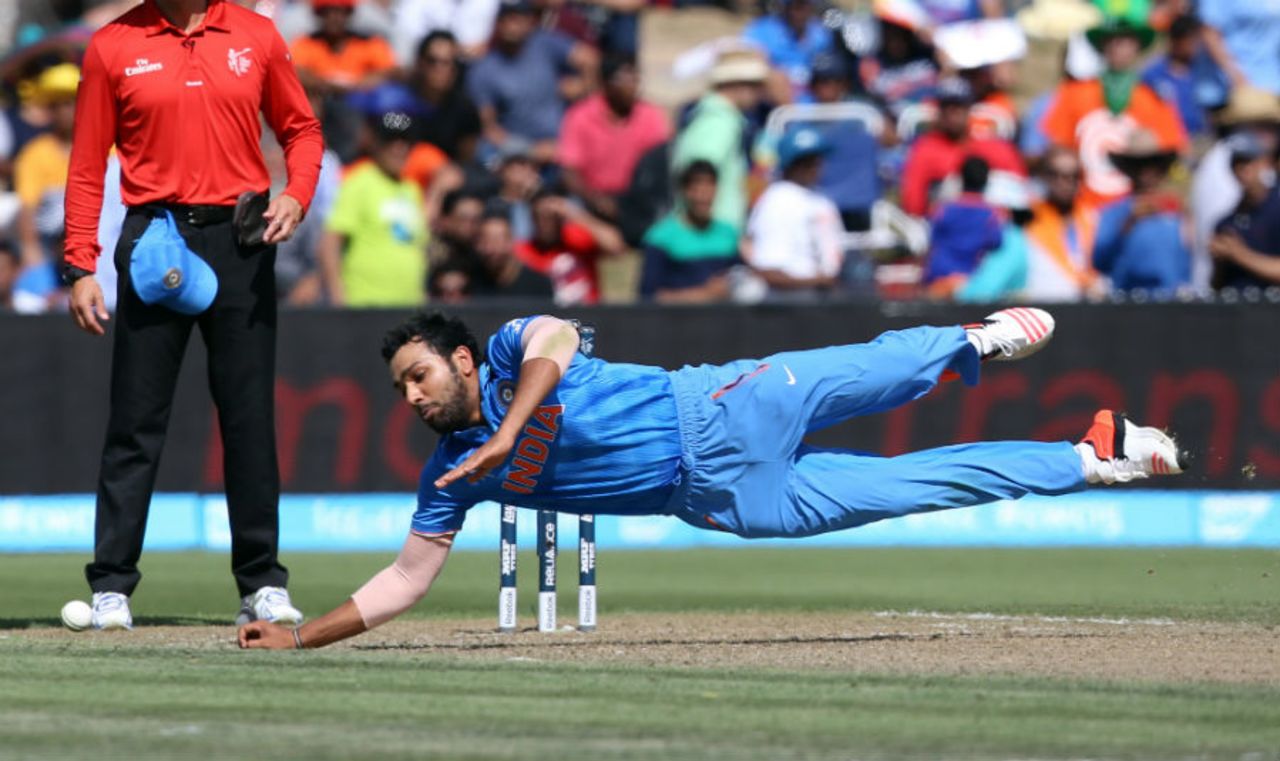 Rohit Sharma fields off his own bowling, India v Ireland, World Cup 2015, Group B, Hamilton, March 10, 2015