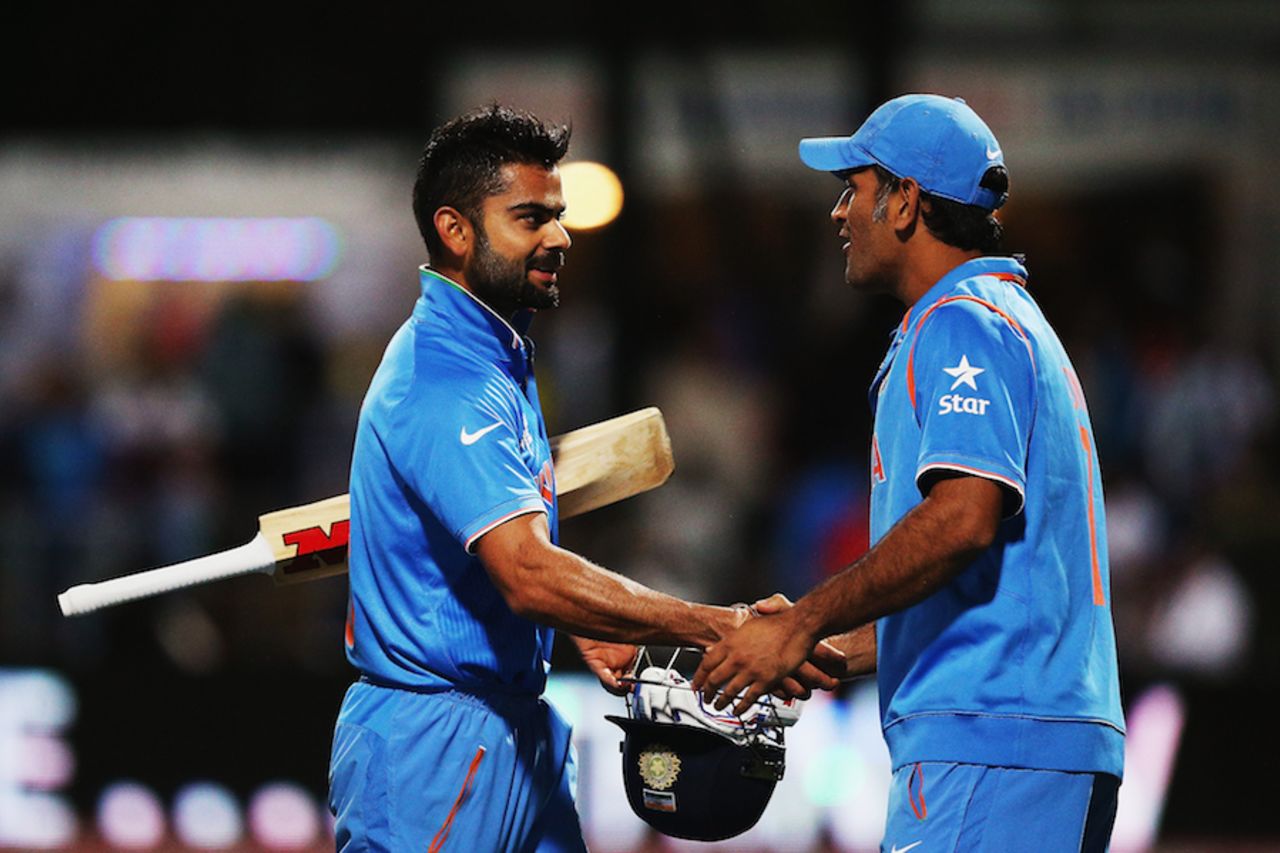 Virat Kohli and MS Dhoni congratulate each other, India v Ireland, World Cup 2015, Group B, Hamilton, March 10, 2015