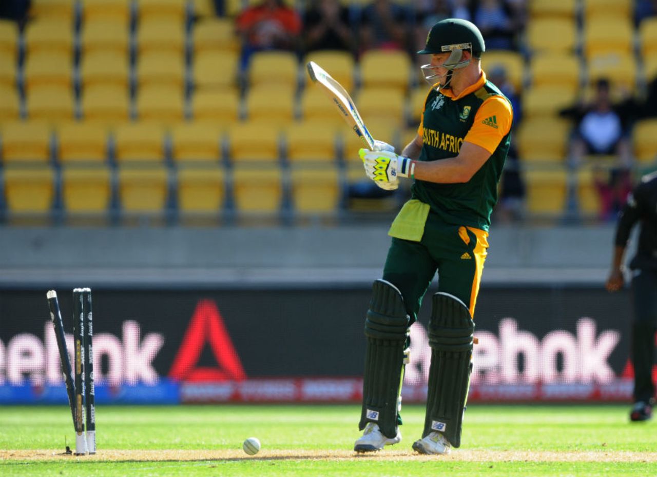 David Miller looks back as he is bowled by Mohammad Naveed, South Africa v United Arab Emirates, World Cup 2015, Group B, Wellington, March 12, 2015