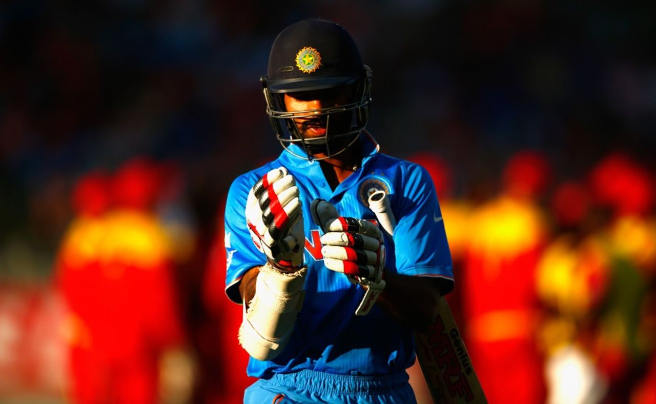 Shikhar Dhawan walks back after dragging one back onto the stumps, India v Zimbabwe, World Cup 2015, Group B, Auckland, March 14, 2015