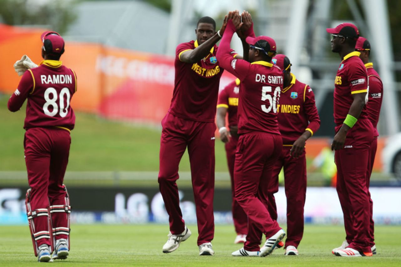 Jason Holder celebrates a wicket, United Arab Emirates v West Indies, World Cup 2015, Group B, Napier, March 15, 2015