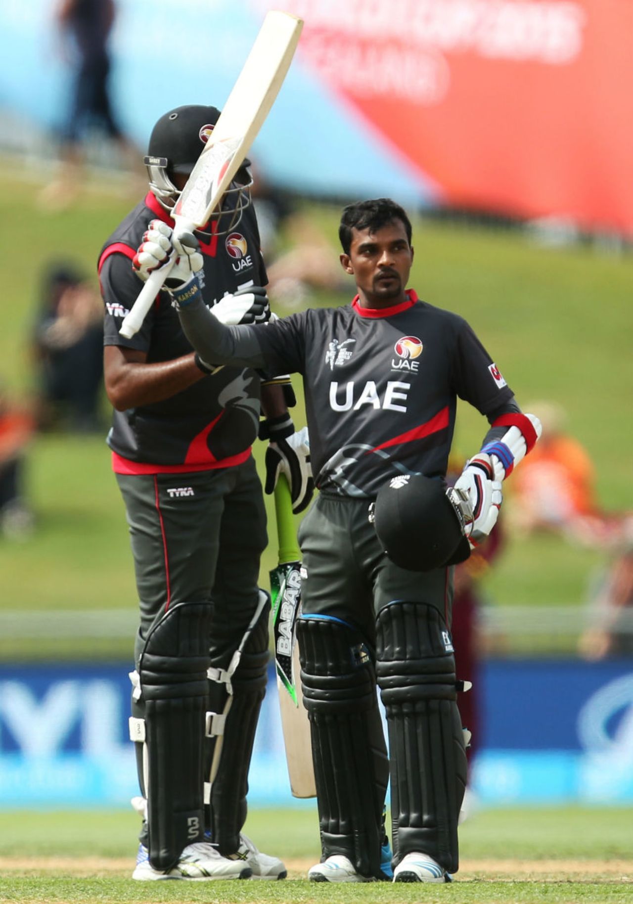 Nasir Aziz raises his bat after getting his maiden ODI fifty, United Arab Emirates v West Indies, World Cup 2015, Group B, Napier, March 15, 2015