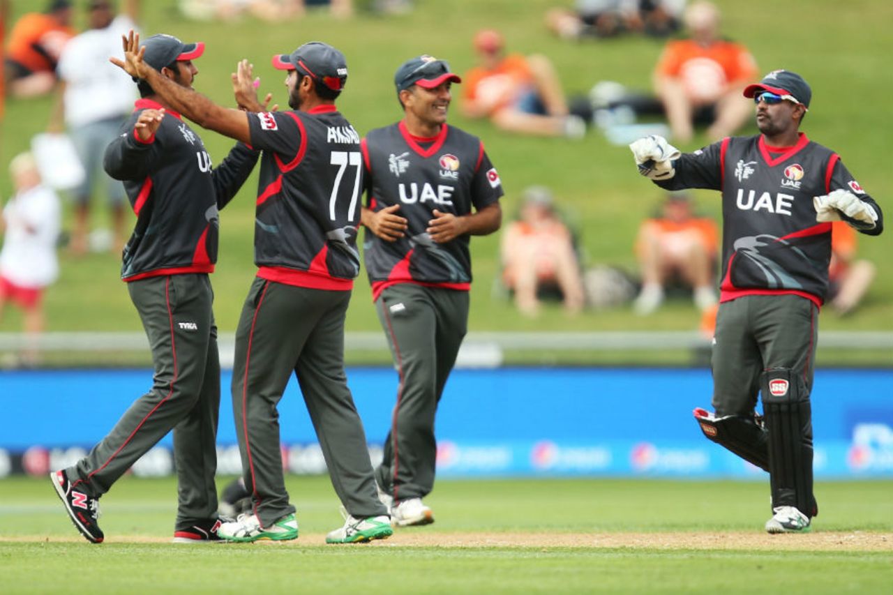 UAE players celebrate the fall of a wicket, United Arab Emirates v West Indies, World Cup 2015, Group B, Napier, March 15, 2015