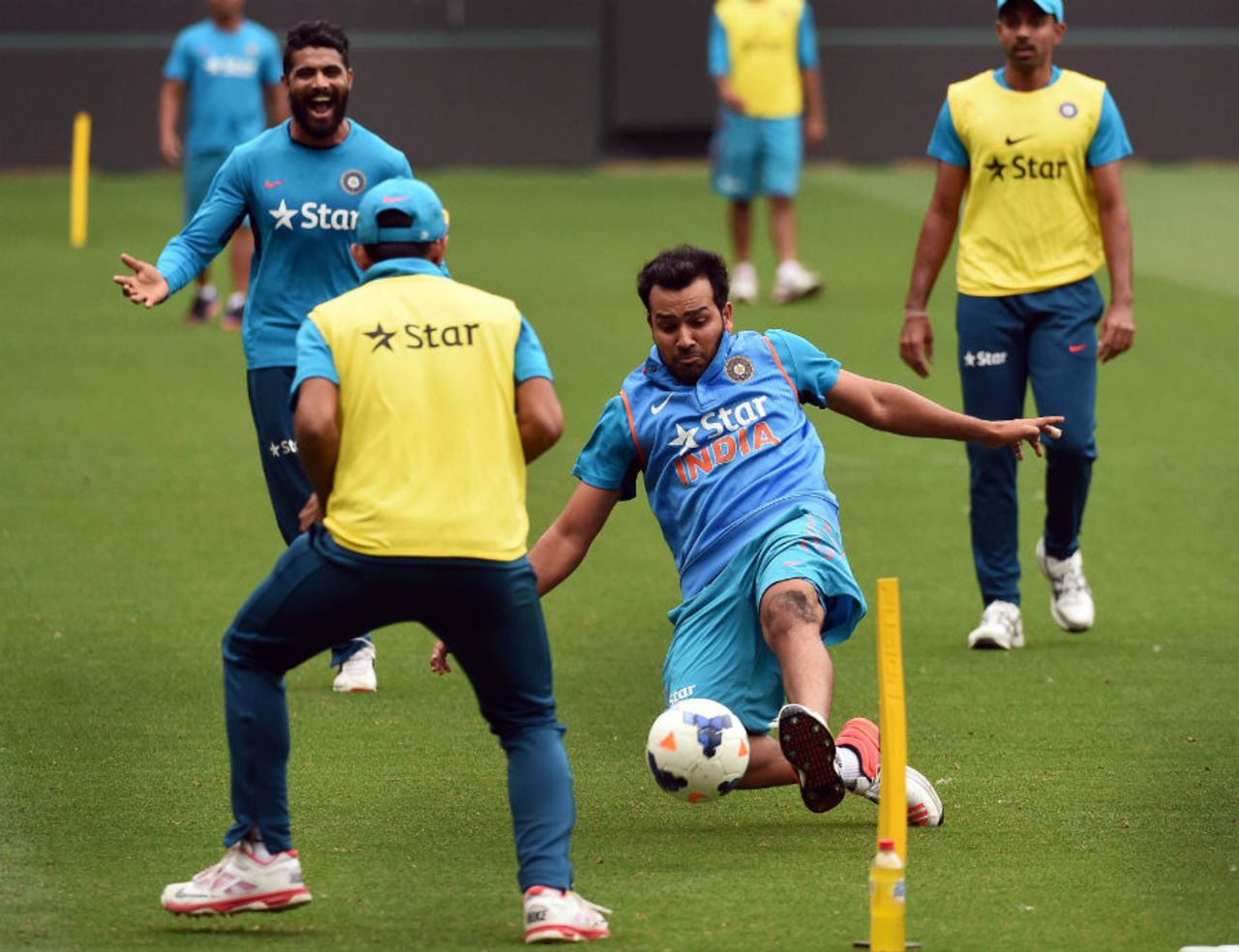 Rohit Sharma stretches to reach the ball during a game of football, World Cup 2015, Melbourne, March 17, 2015