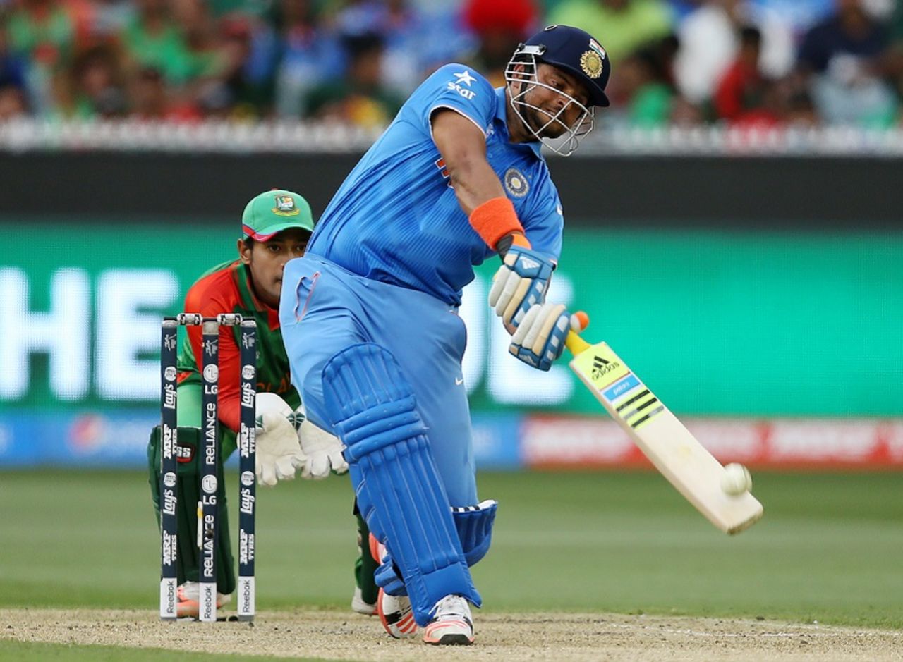 Suresh Raina hoists the ball over long-on, Bangladesh v India, World Cup 2015, 2nd quarter-final, Melbourne, March 19, 2015