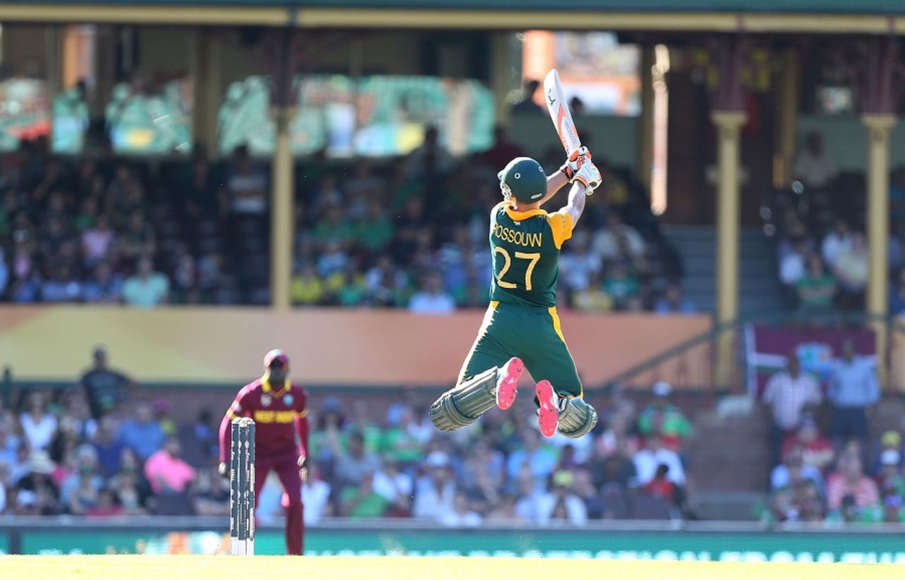 Rilee Rossouw leaps off his feet and unfurls an uppercut, South Africa v West Indies, World Cup 2015, Group B, Sydney, February 27, 2015
