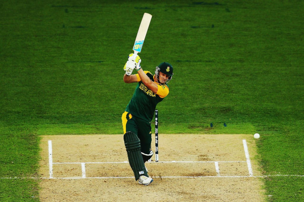 David Miller launches the ball down the ground, New Zealand v South Africa, World Cup 2015, 1st Semi-Final, Auckland, March 24, 2015