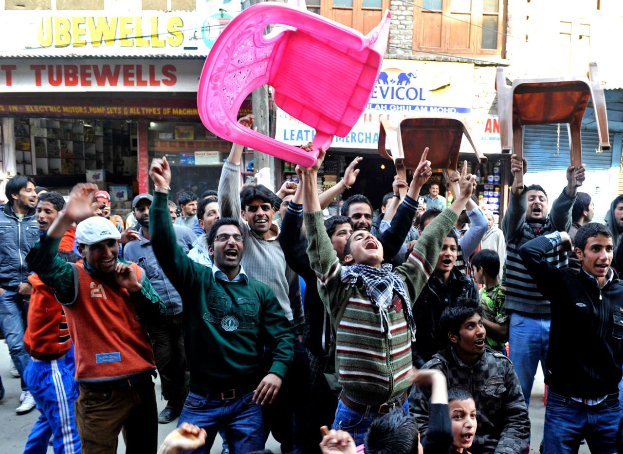 Fans in Srinagar celebrate an Indian wicket, India v Pakistan, World Cup, 2nd semi-final, Mohali, March 30, 2011