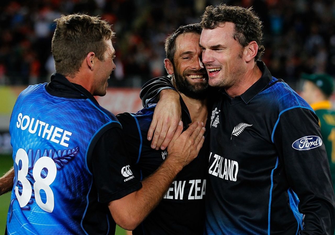 Grant Elliott, Kyle Mills and Tim Southee soak in the historic win, New Zealand v South Africa, World Cup 2015, 1st semi-final, Auckland, March 24, 2015