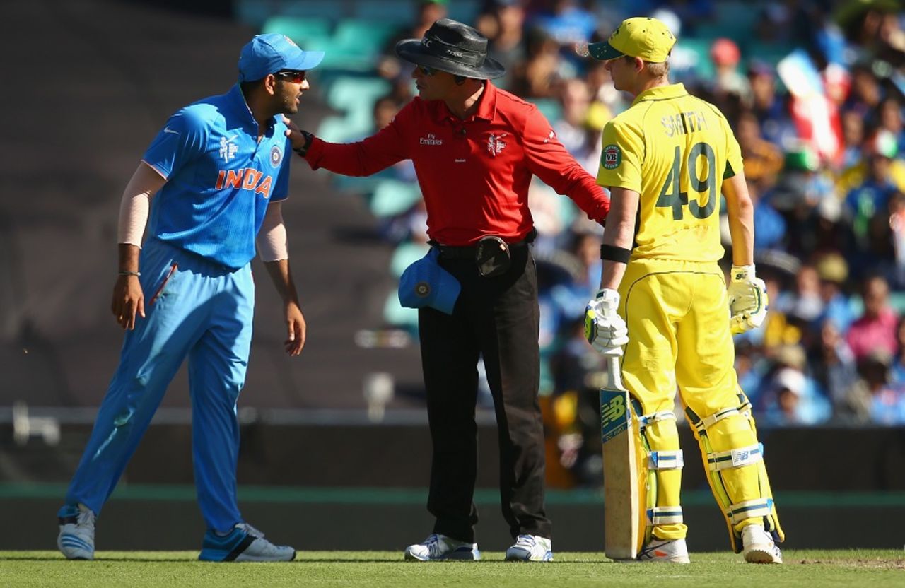 Umpire Richard Kettleborough intervenes as Rohit Sharma and Steven Smith have a go at each other,  Australia v India, World Cup 2015, 2nd semi-final, Sydney, March 26, 2015