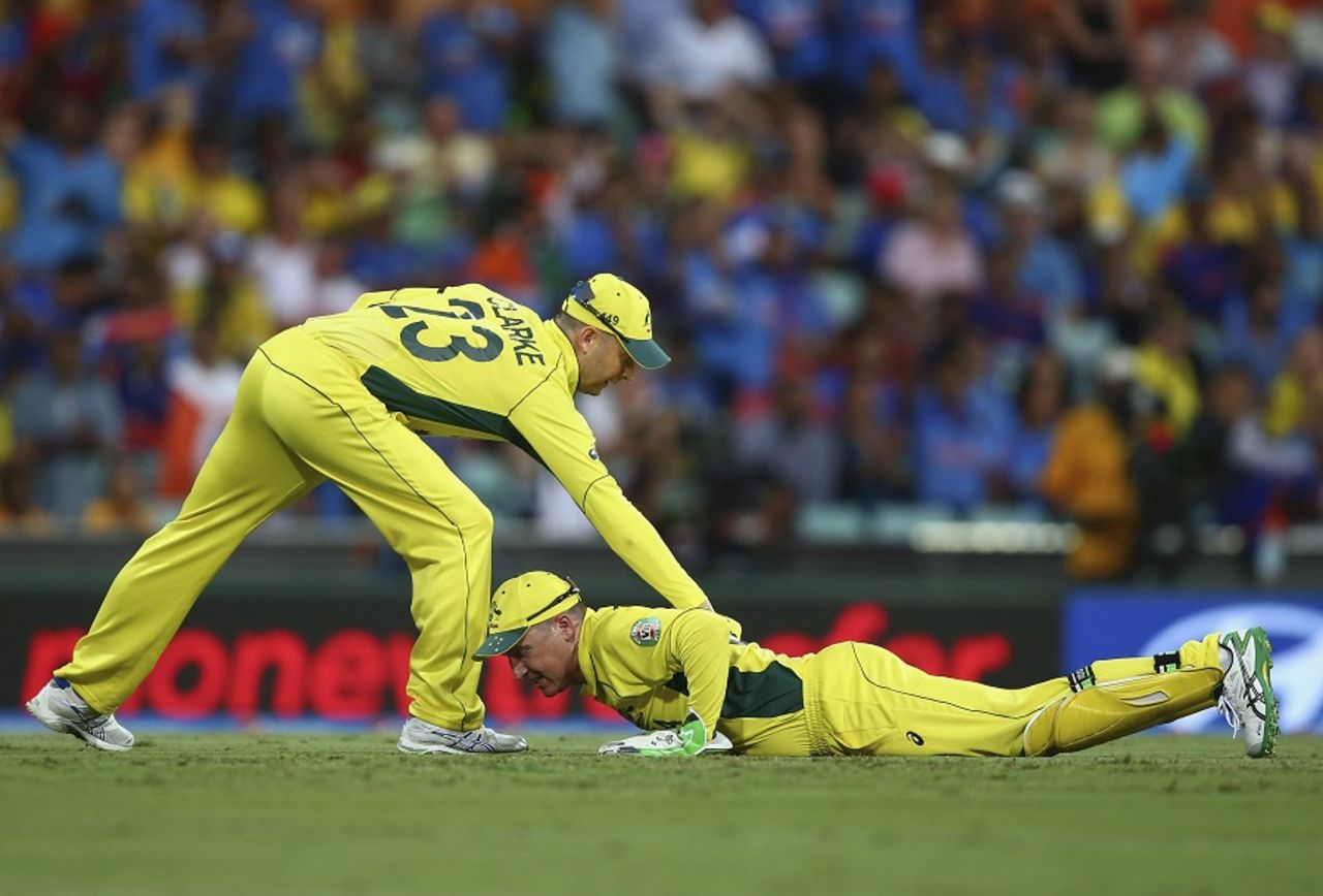Michael Clarke consoles Brad Haddin after he dropped Shikhar Dhawan on 5, Australia v India, World Cup 2015, 2nd semi-final, Sydney, March 26, 2015