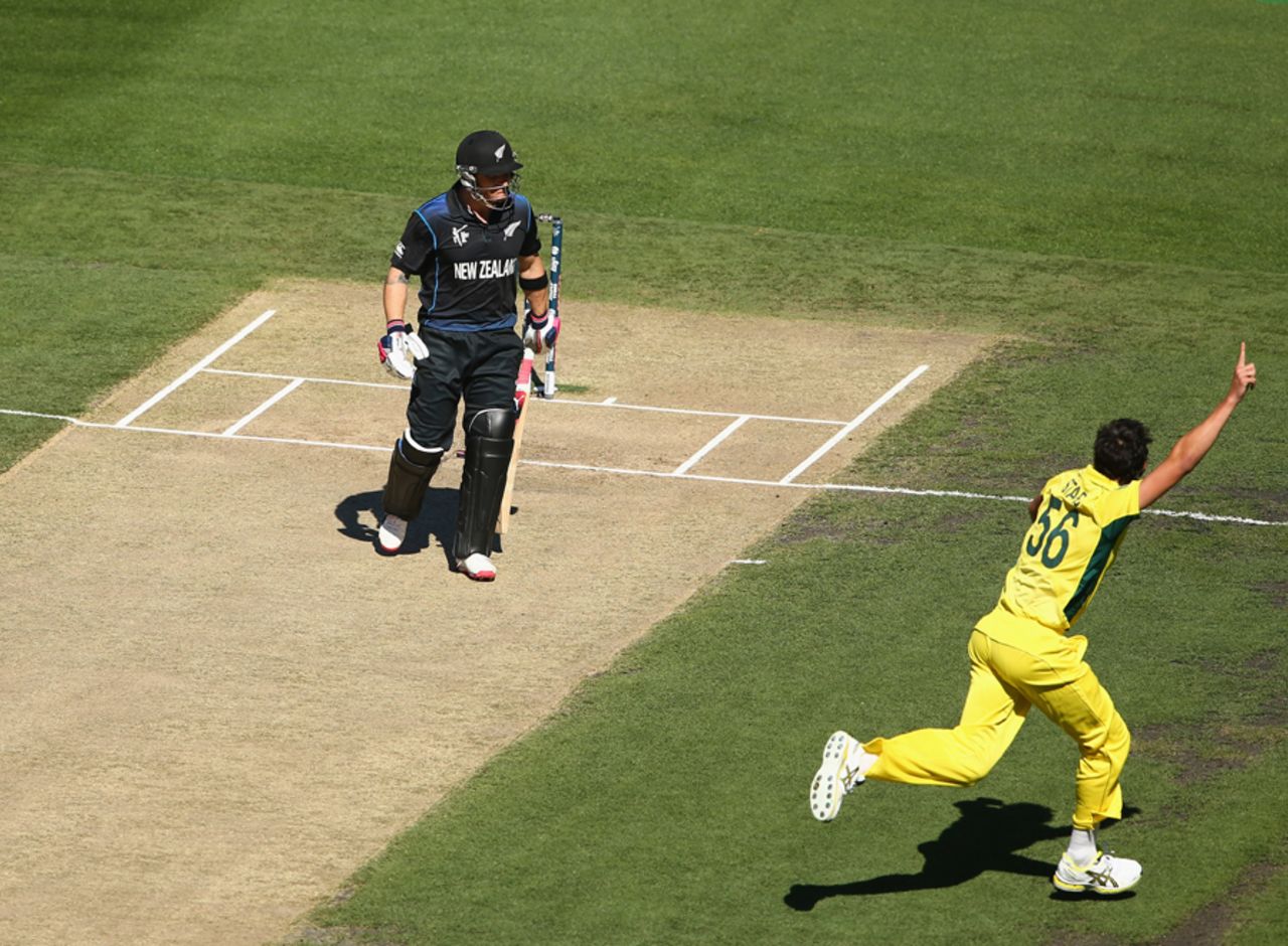 Mitchell Starc races away after bowling Brendon McCullum, Australia v New Zealand, World Cup 2015, final, Melbourne, March 29, 2015
