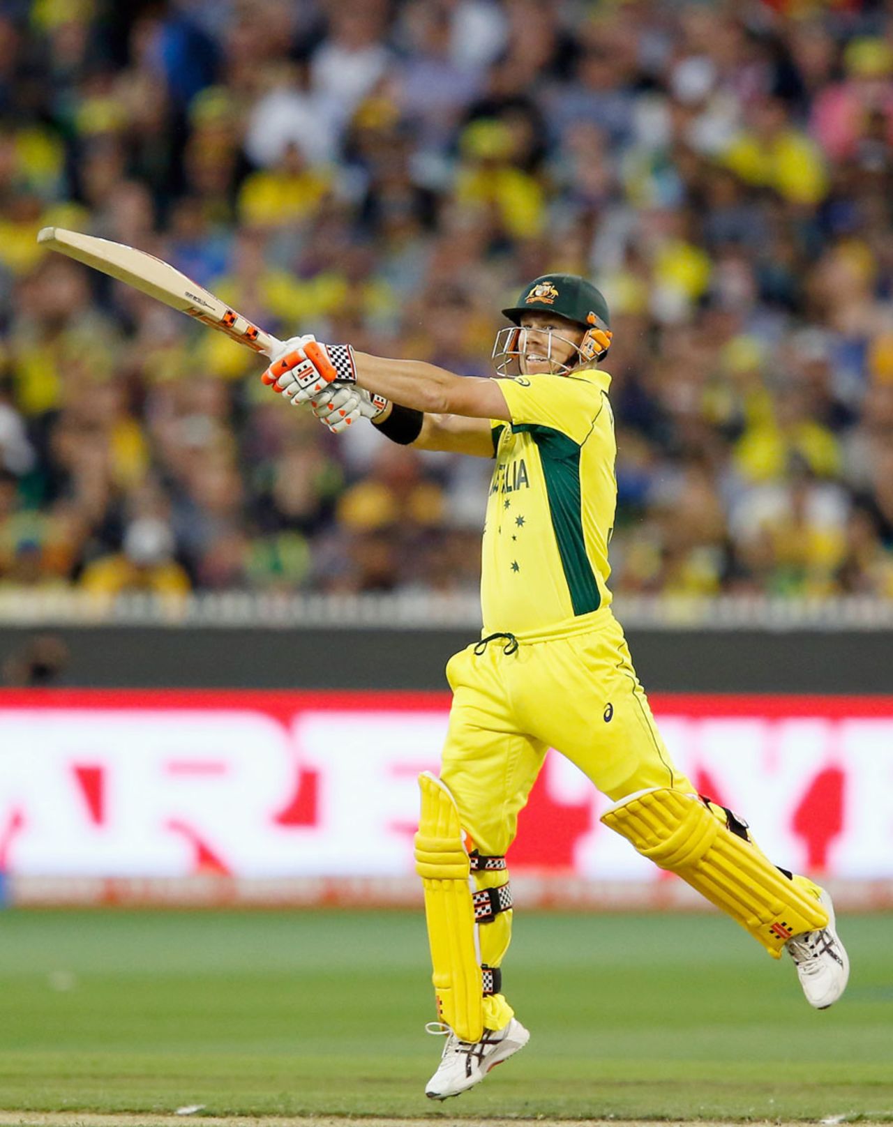 David Warner gets off his toes and plays a shot, Australia v New Zealand, World Cup 2015, final, Melbourne, March 29, 2015