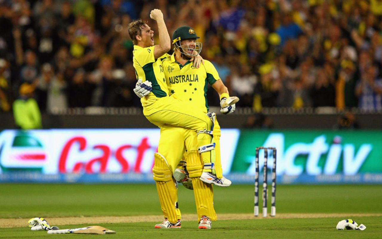 Steven Smith and Shane Watson celebrate Australia's fifth World Cup title, Australia v New Zealand, World Cup 2015, final, Melbourne, March 29, 2015
