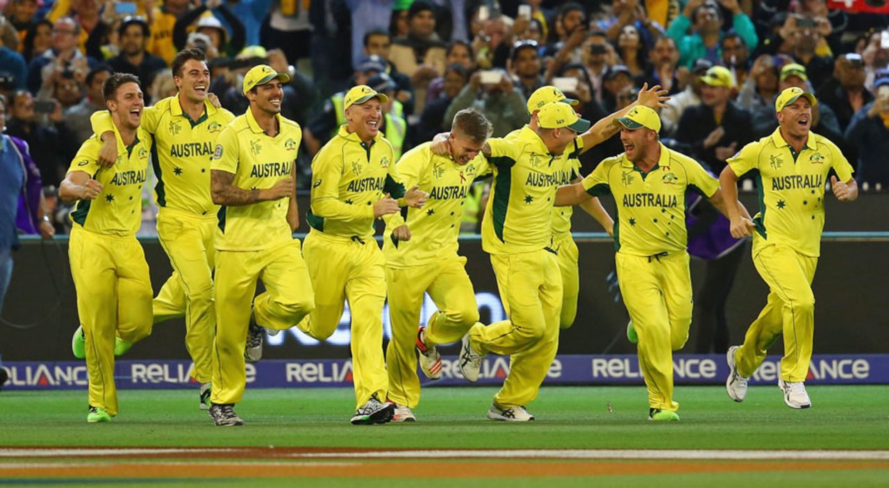 Members of the Australia side run on to the field after their World Cup victory, Australia v New Zealand, World Cup 2015, final, Melbourne, March 29, 2015