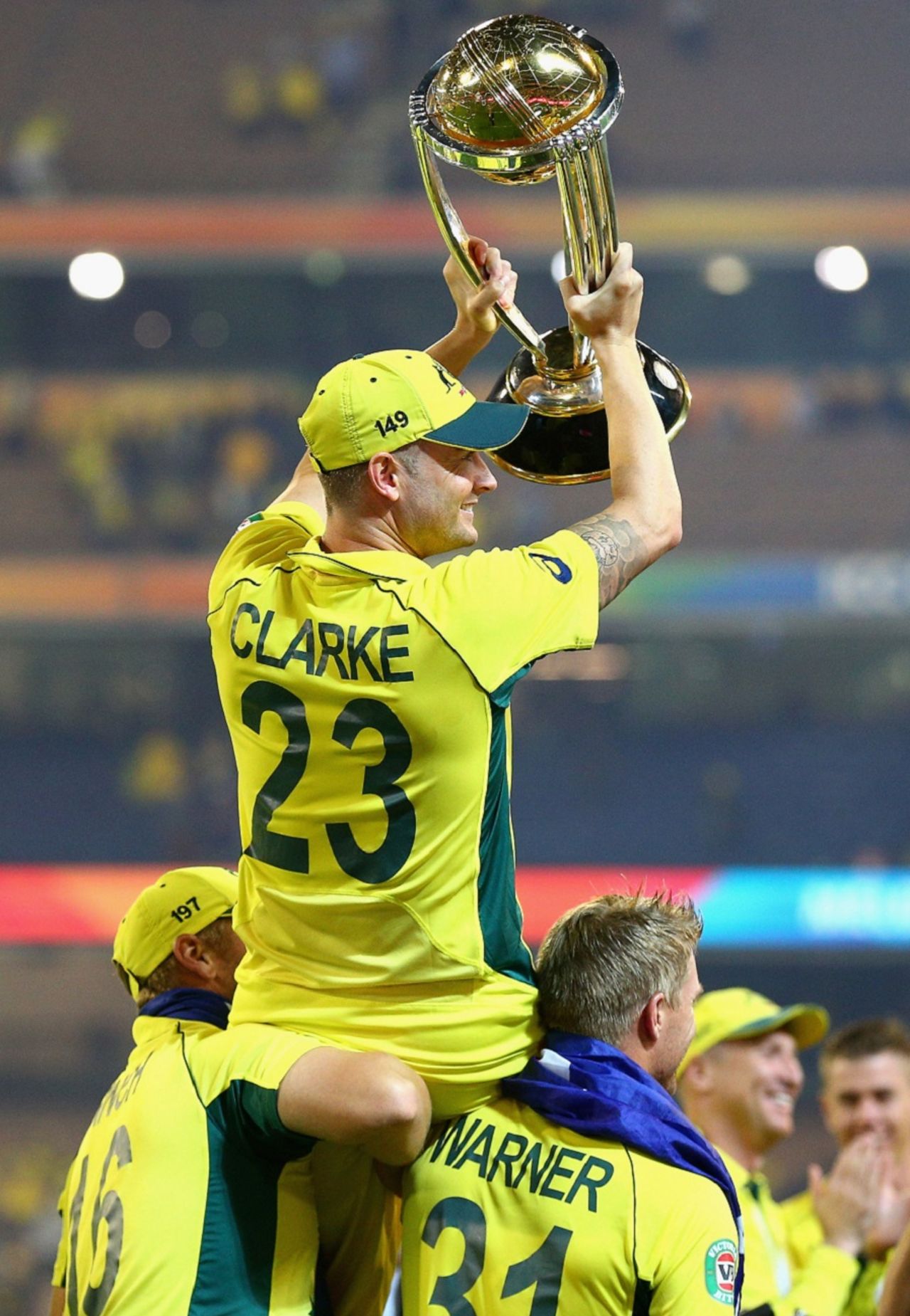Aaron Finch and David Warner hoist Michael Clarke on their shoulders, Australia v New Zealand, World Cup 2015, final, Melbourne, March 29, 2015