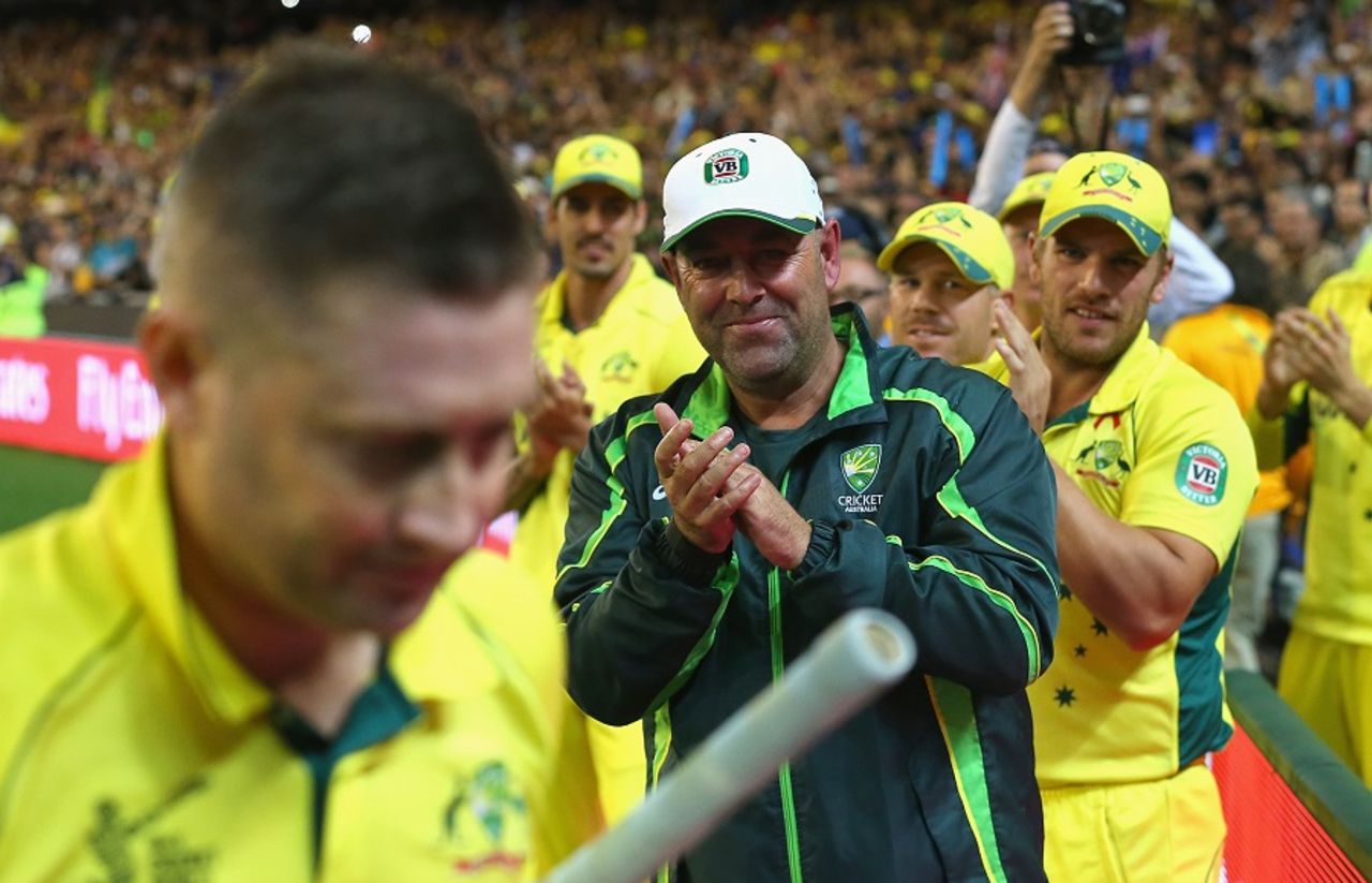 Darren Lehmann applauds as Michael Clarke walks back, Australia v New Zealand, World Cup 2015, final, Melbourne, March 29, 201