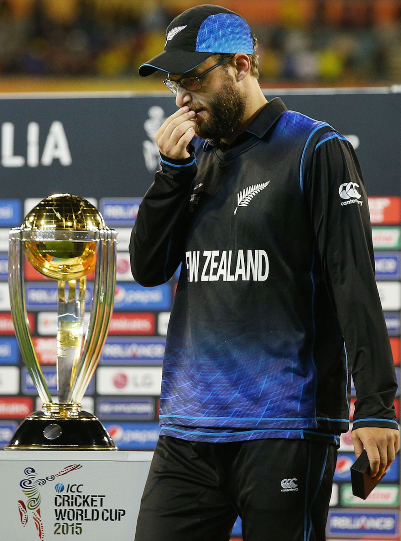 So near...: Daniel Vettori walks past the World Cup trophy,  Australia v New Zealand, World Cup 2015, final, Melbourne, March 29, 2015