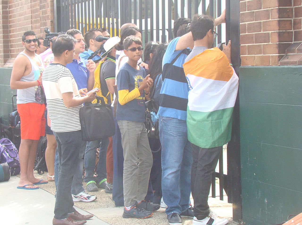 Indian fans at Seddon Park try to catch a glimpse of the players, Hamilton, March 2015