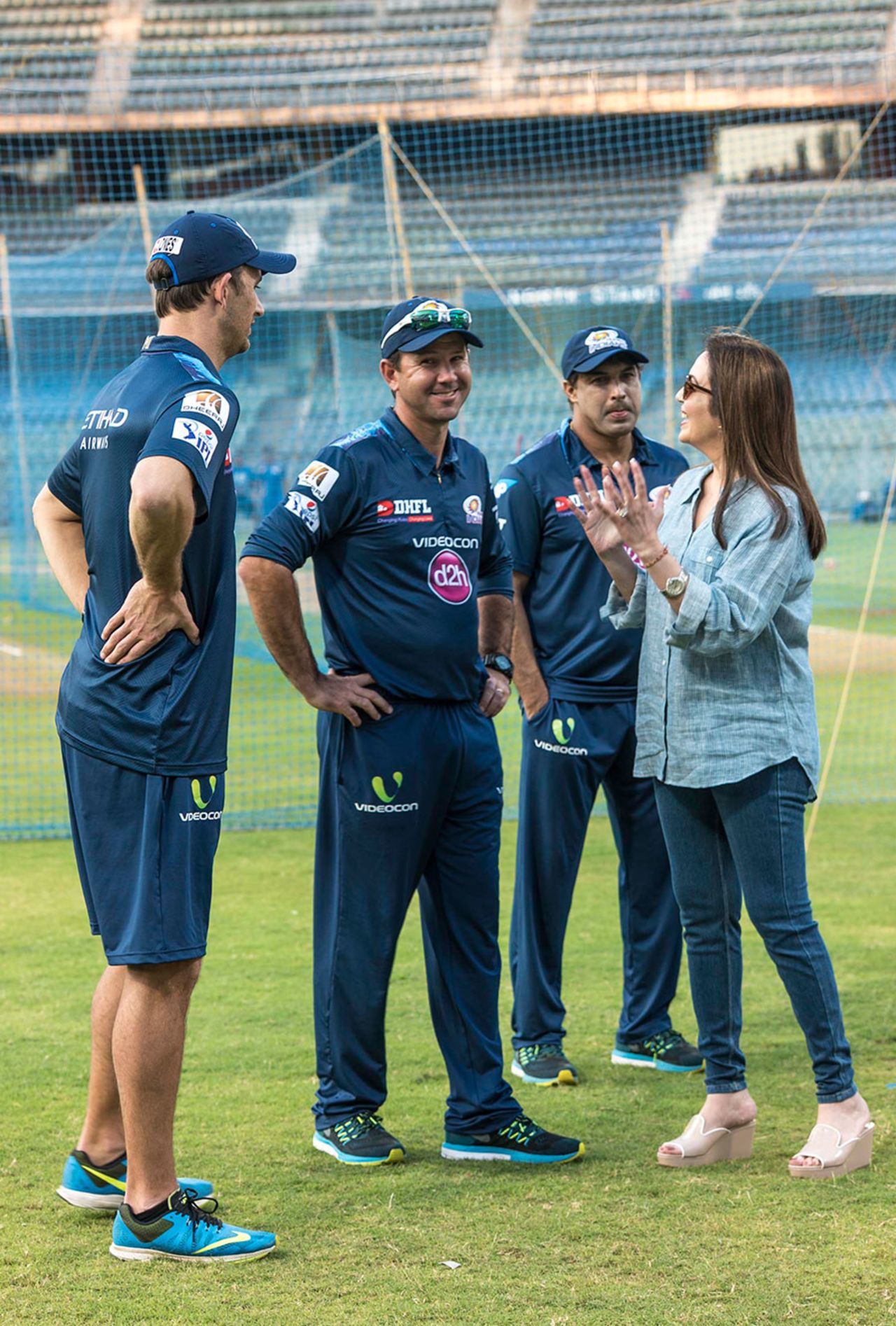 Mumbai Indians owner Nita Ambani talks to members of the team's coaching staff, Mumbai, April 3, 2014