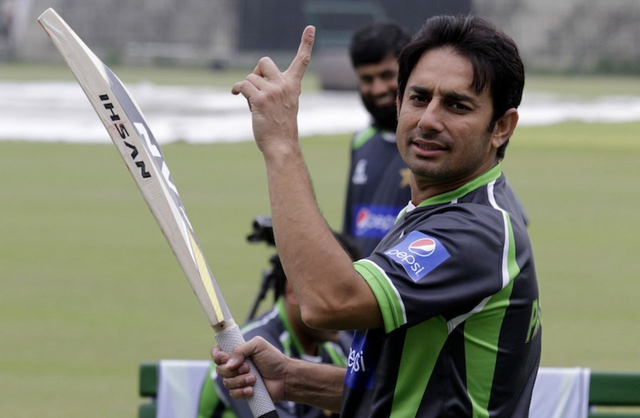 Saeed Ajmal gestures on the sidelines of a practice session, Lahore, April 7, 2015