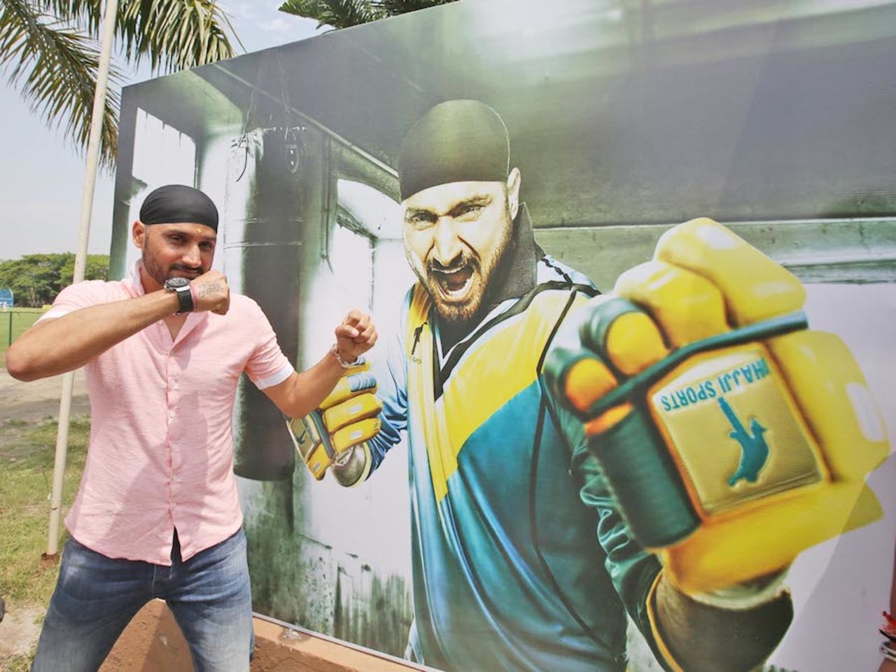Harbhajan Singh poses at the launch of his cricket academy, Kolkata, April 8, 2015