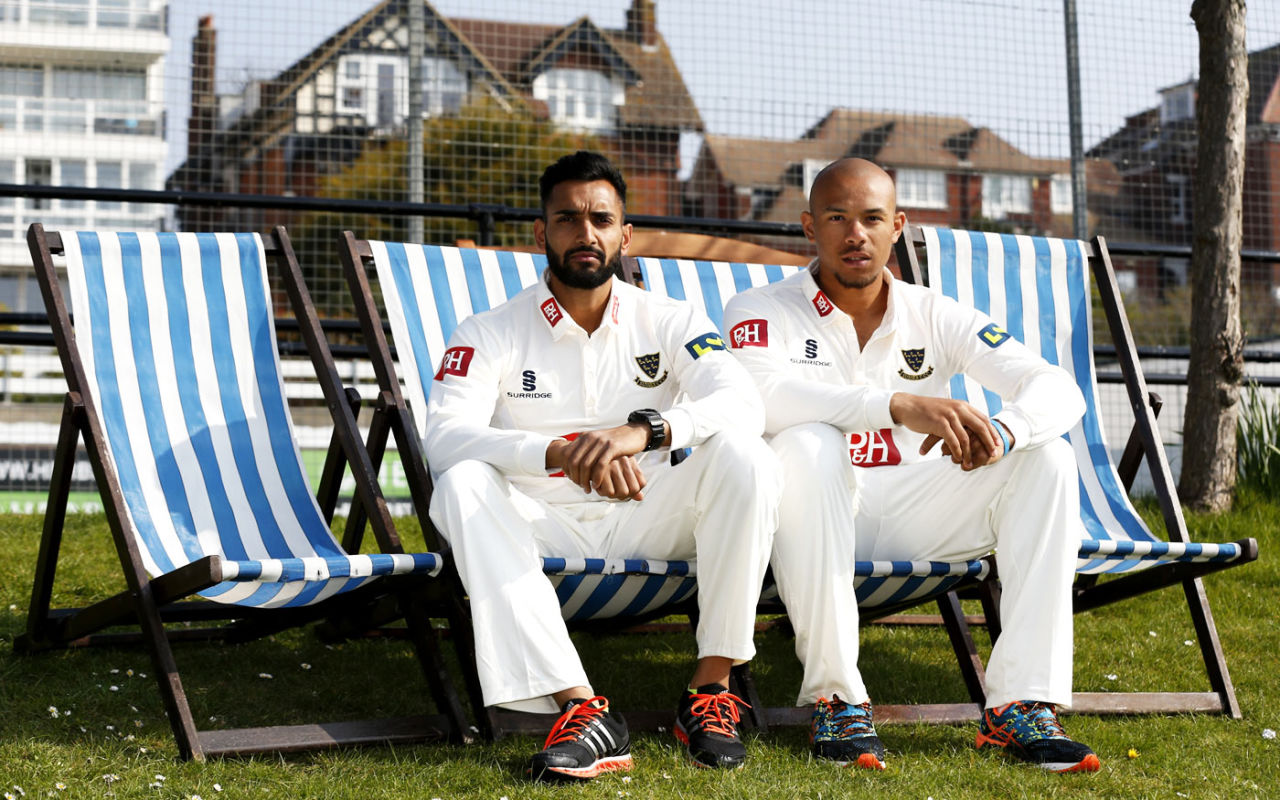 Ajmal Shahzad and Tymal Mills sit on deck chairs at a Sussex photocall , Hove, April 9, 2015