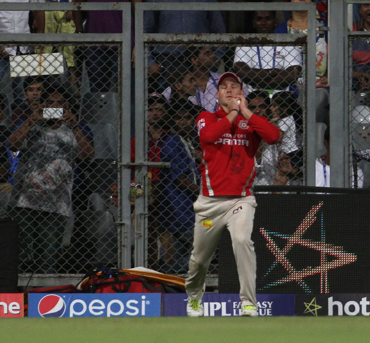 David Miller holds on to a catch from Kieron Pollard, Mumbai Indians v Kings XI Punjab, IPL 2015, Mumbai, April 12, 2015