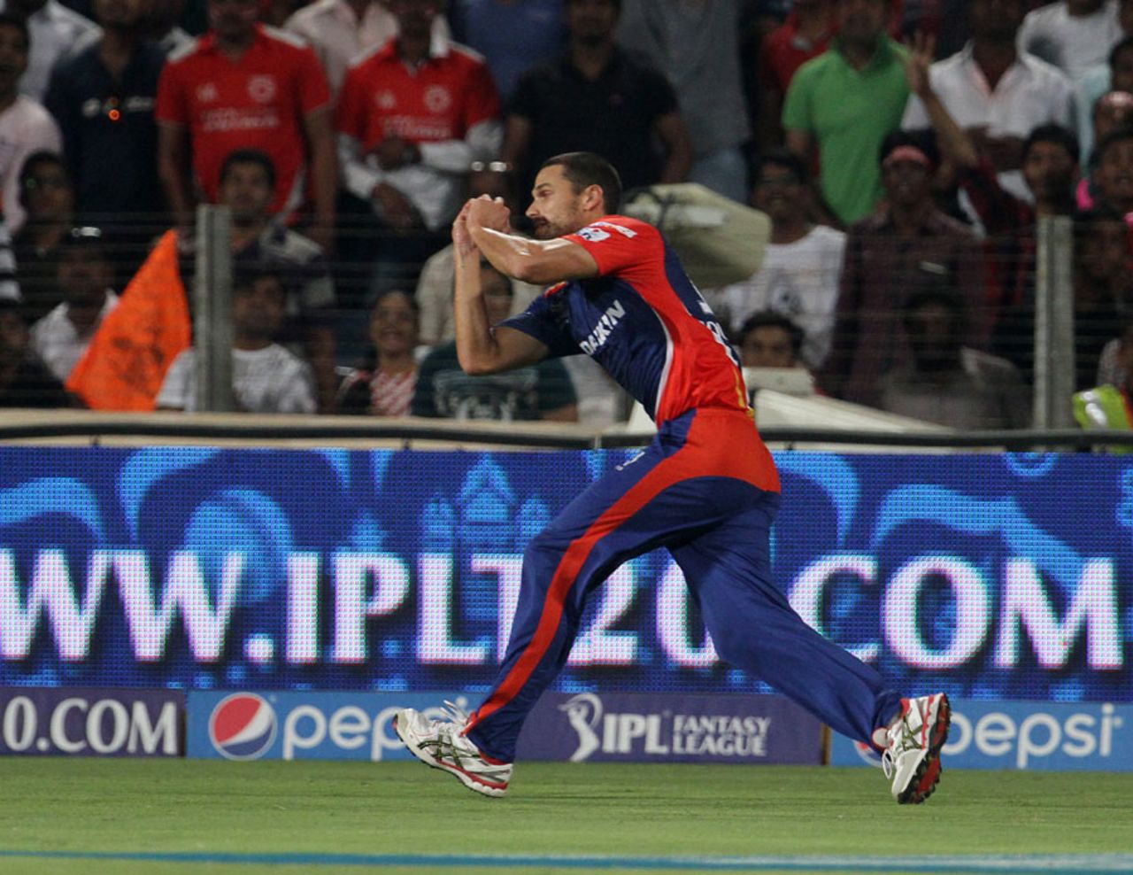 Nathan Coulter-Nile holds on to a catch from Virender Sehwag, Kings XI Punjab v Delhi Daredevils, IPL 2015, Pune, April 15, 2015