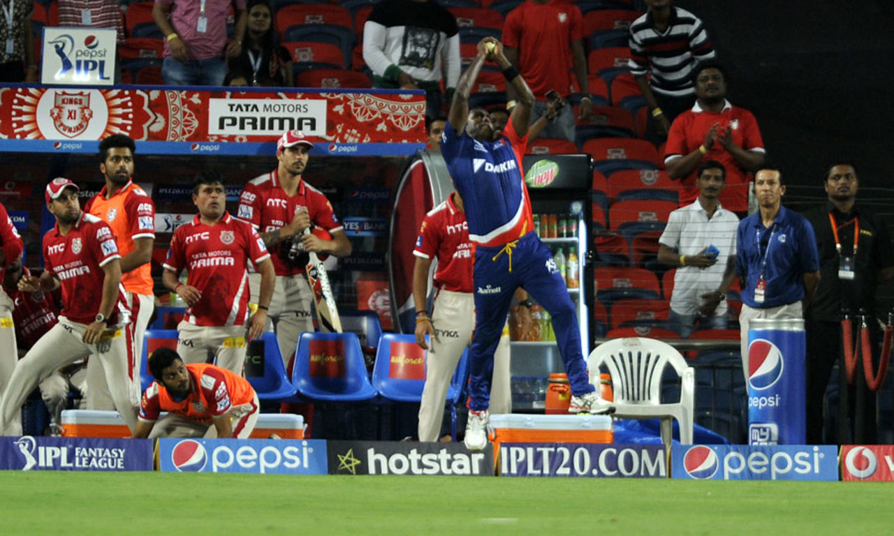 Angelo Mathews leaps and grabs an offering from Axar Patel, Kings XI Punjab v Delhi Daredevils, IPL 2015, Pune, April 15, 2015