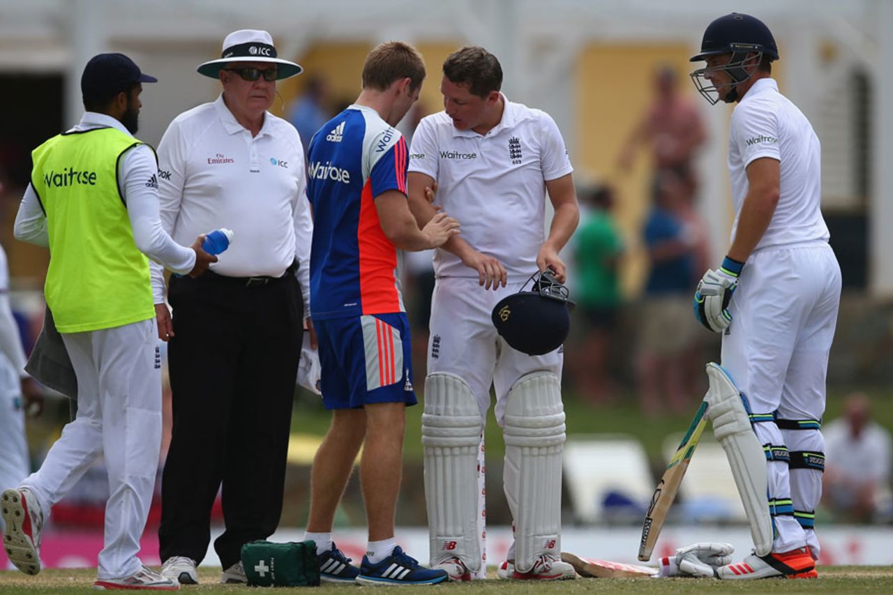Gary Ballance required some treatment after being struck by a drive from Jos Buttler, West Indies v England, 1st Test, North Sound, 4th day, April 16, 2015