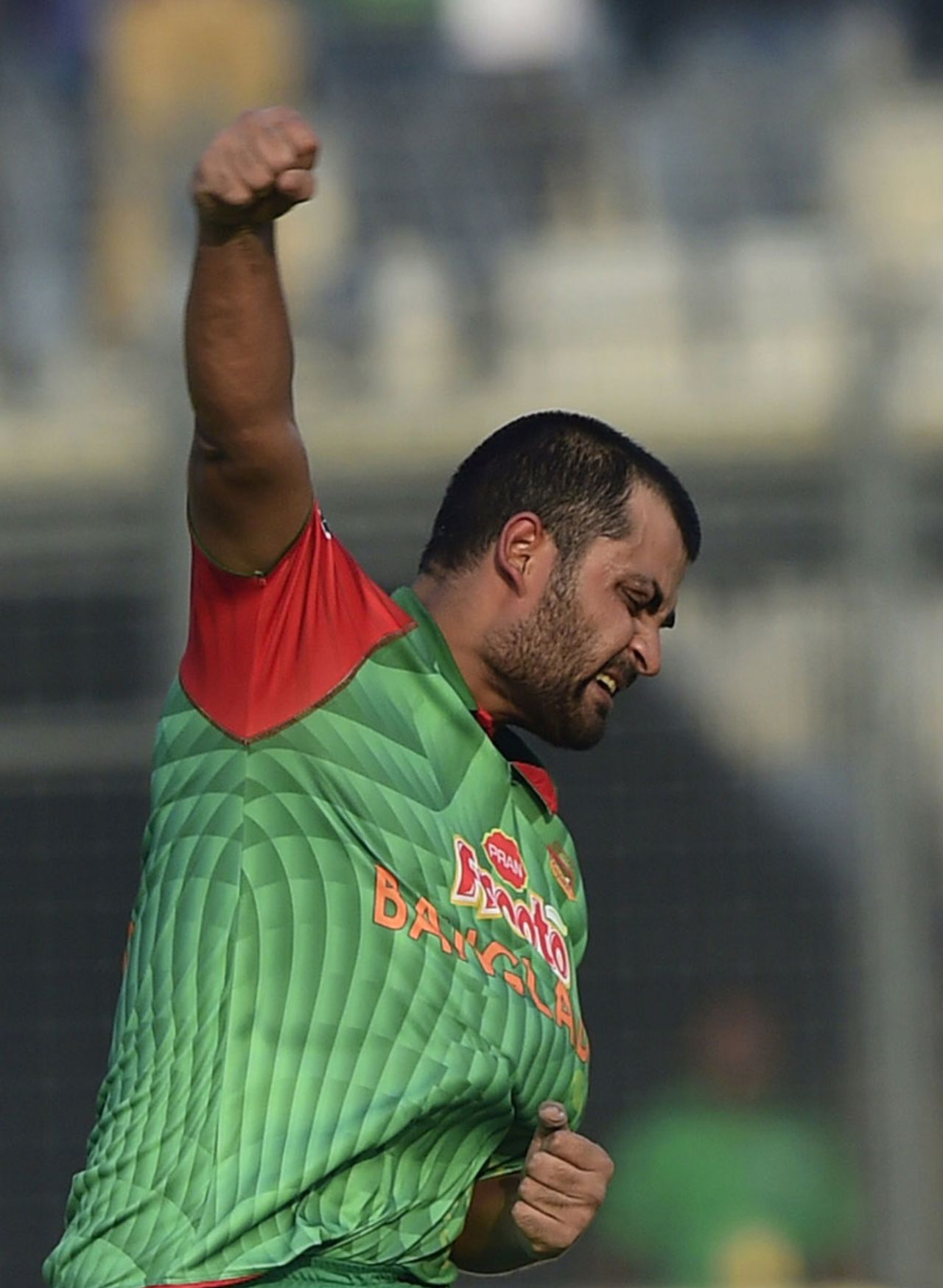 Tamim Iqbal punches the air in delight after reaching his ton, Bangladesh v Pakistan, 1st ODI, Mirpur, April 17, 2015