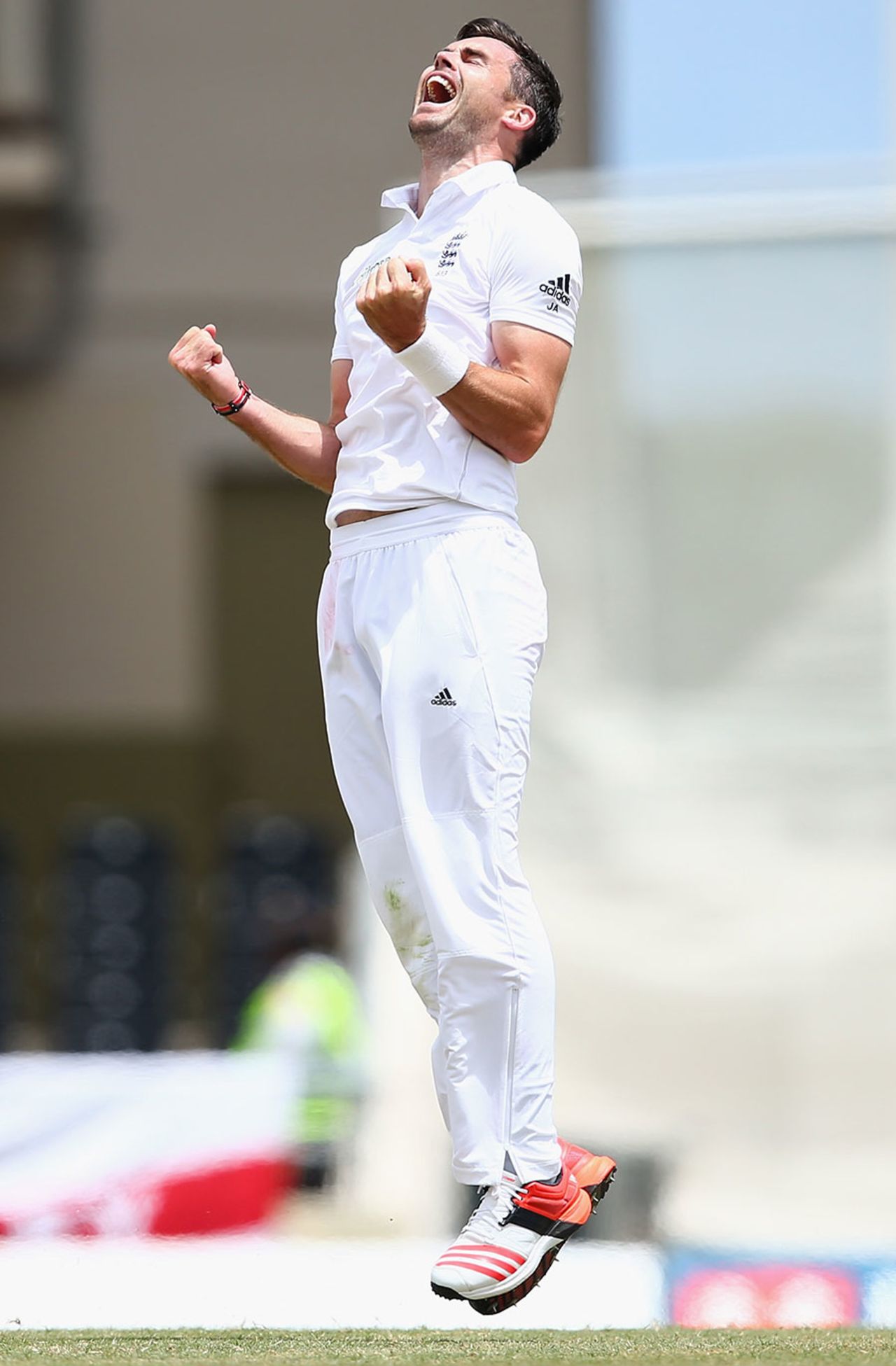 James Anderson leaps for joy at equalling Sir Ian Botham's record, West Indies v England, 1st Test, North Sound, 5th day, April 17, 2015