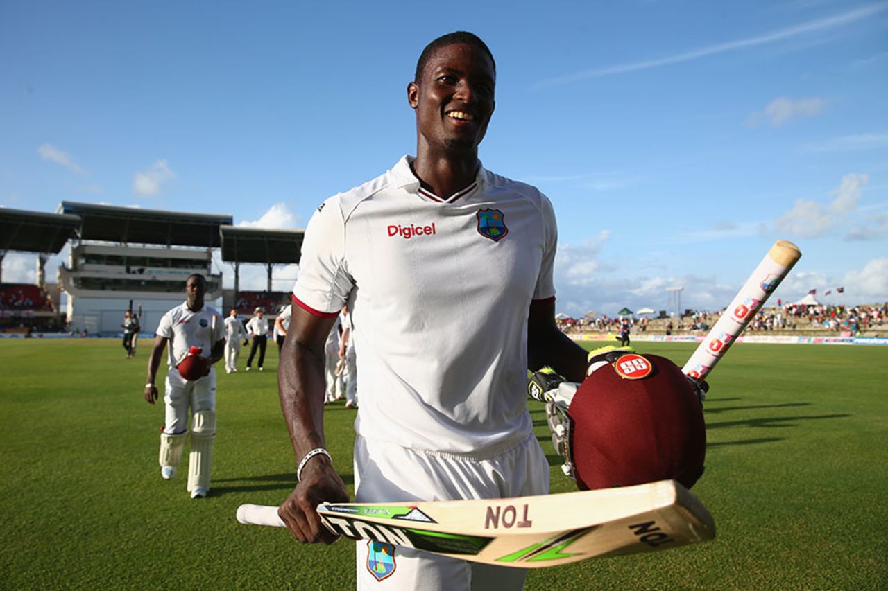 Jason Holder leaves the field beaming after his maiden Test century saved the match, West Indies v England, 1st Test, North Sound, 5th day, April 17, 2015