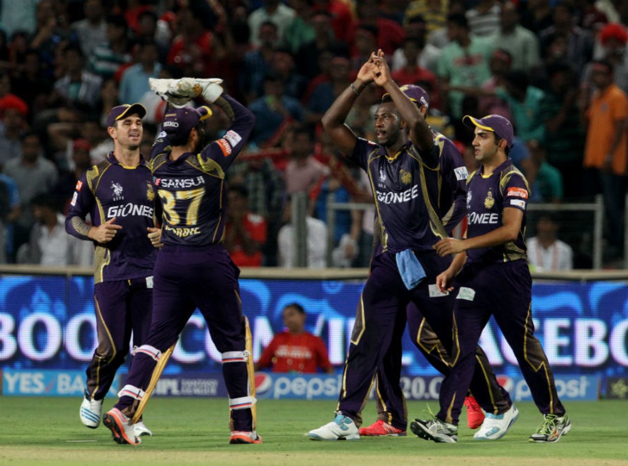 Andre Russell celebrates a wicket with his team-mates, Kings XI Punjab v Kolkata Knight Riders, IPL 2015, Pune, April 18, 2015
