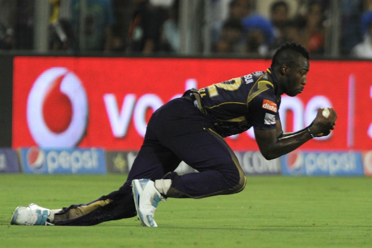 Andre Russell dives forward to take a catch, Kings XI Punjab v Kolkata Knight Riders, IPL 2015, Pune, April 18, 2015
