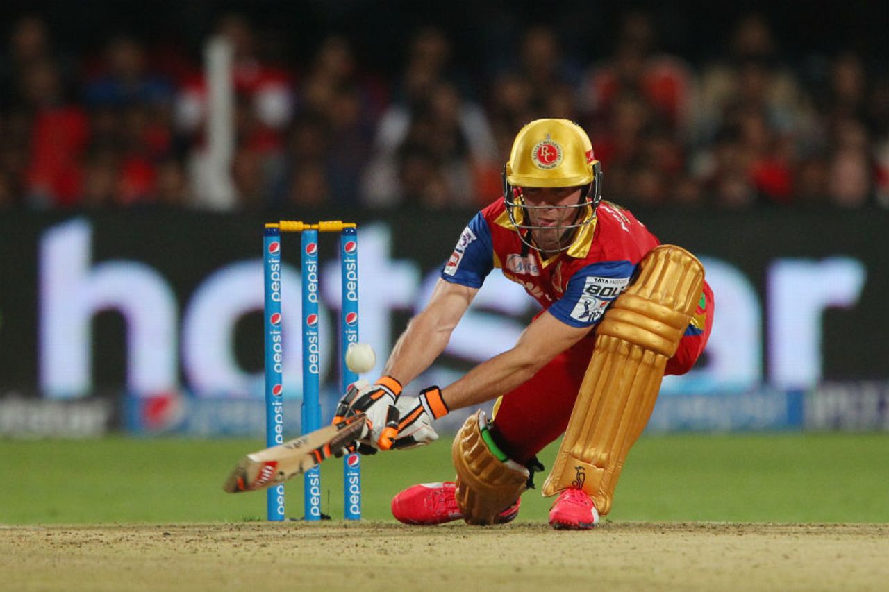 AB de Villiers plays one of his more innovative shots, Royal Challengers Bangalore v Mumbai Indians, IPL 2015, Bangalore, April 19, 2015
