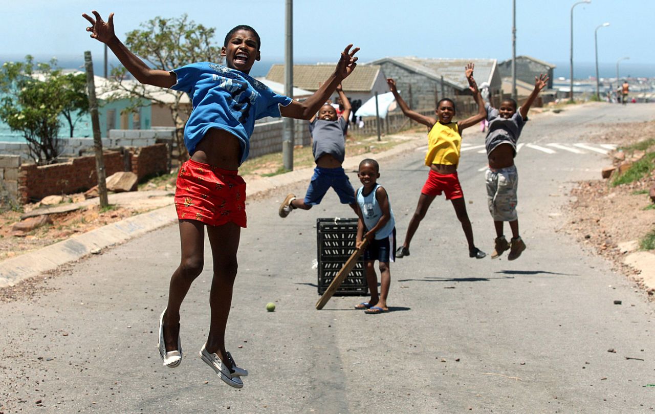 Kids play street cricket at Helenvale, South Africa, January 15, 2009