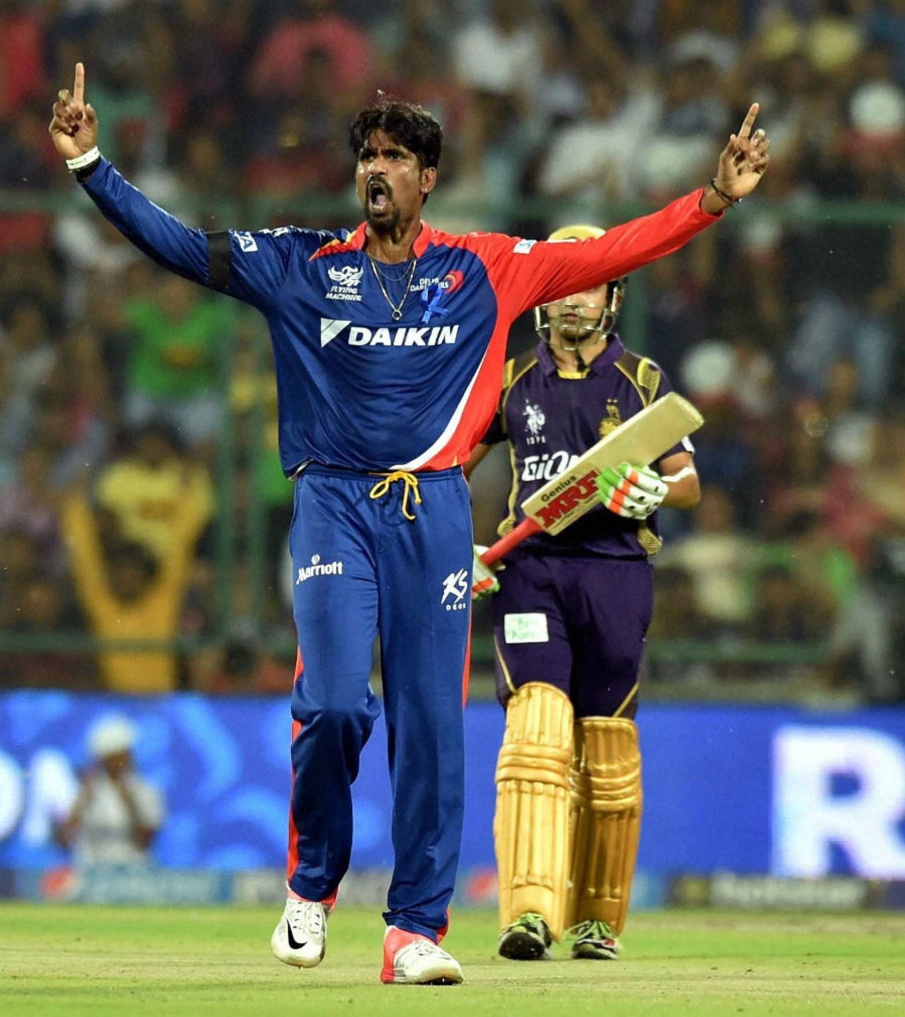 Domnic Muthuswami exults after picking a wicket, Delhi Daredevils v Kolkata Knight Riders, IPL 2015, Delhi, April 20, 2015